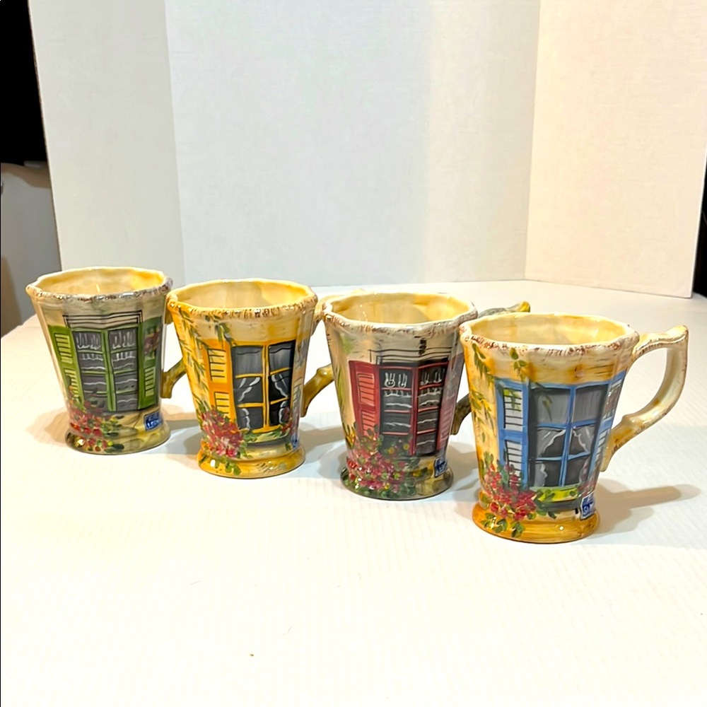 Set a four table tops unlimited Rue De Paris handpainted 16 ounce coffee mugs